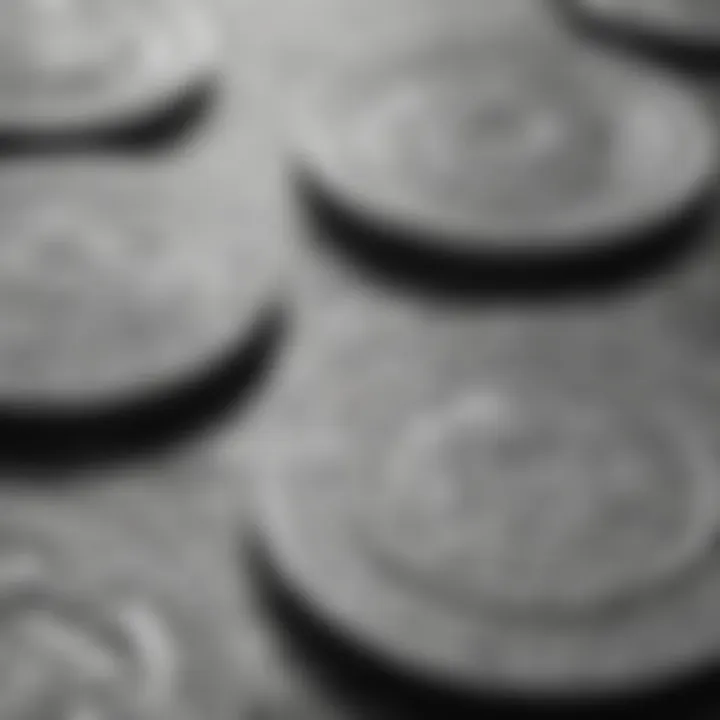 Close-up of APMEX silver coins displaying intricate designs